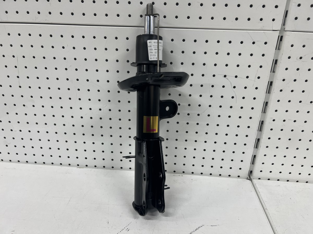 Амортизатор передний левый Geely Emgrand 7 New SS11 оригинал